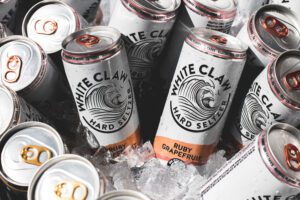 White Clam Ruby Grapefruit Cans Placed in Ice Copy